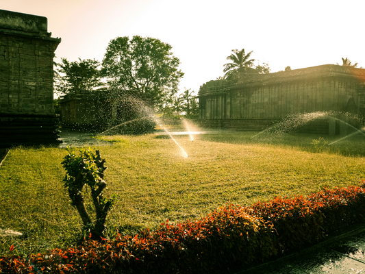 Irrigation Spraying Water On A Residential Lawn
